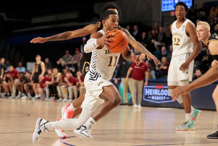 Justin Moore led Drexel with 16 points off the bench but it wasn't enough to get past UNC Wilmington in quarterfinal play of the CAA men's conference tournament on Sunday.