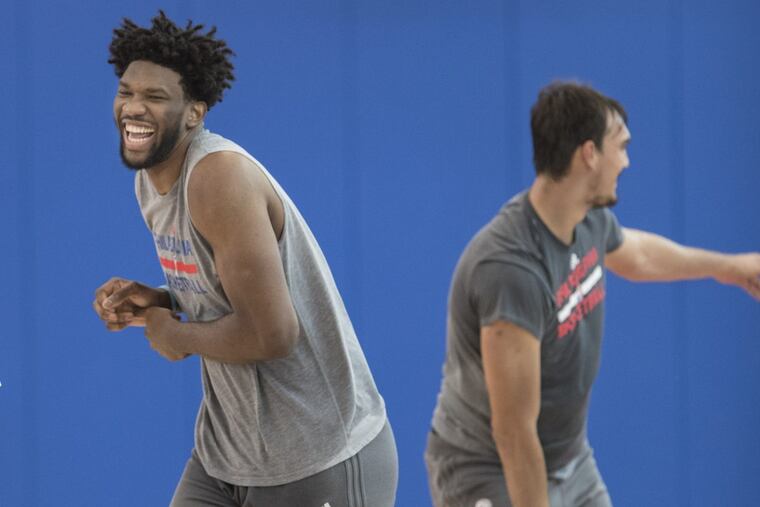 The Philadelphia 76ers’ Joel Embiid (left) and Dario Saric (right) are two of the three finalists for the NBA’s 2016-17 Rookie of the Year Award.