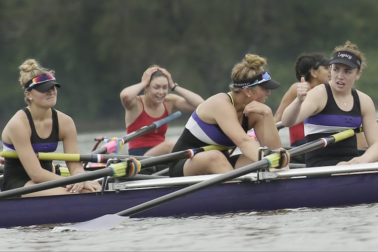 The Mount St. Joseph rowers (foreground) following their second-place finish in the girls’ senior eight at the Stotesbury Cup Regatta.