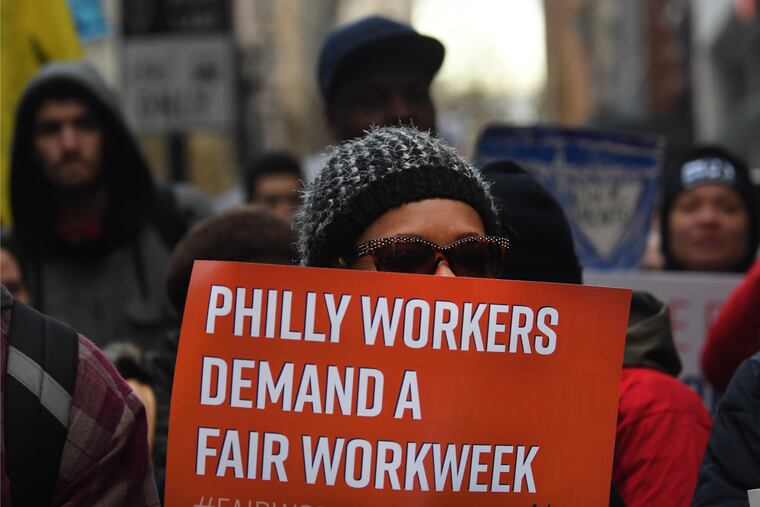 Fast food and retail workers marched in February as part of the launch of a local effort to fight for "Fair Workweek" legislation, which have been passed in San Francisco and New York and mandates that companies use fair scheduling practices for their workers. JOSE F. MORENO / Staff Photographer