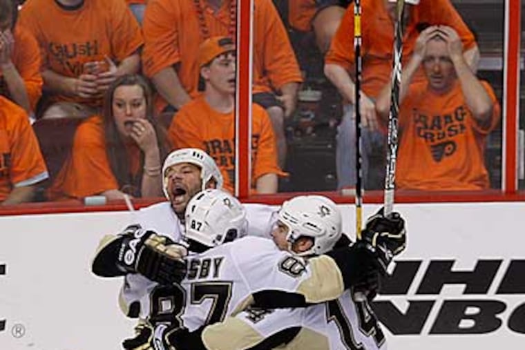 Fyers fans are stunned after Syndey's Crosby goal in the second period. (Ron Cortes / Staff Photographer )