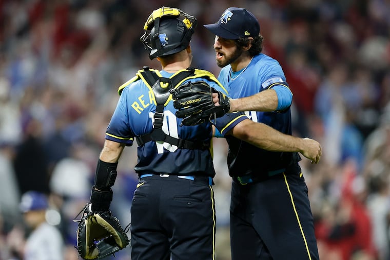 Phillies catcher J.T. Realmuto and pitcher Jordan Romano teamed up in a big way for Romano's first save as a Phillie on Friday night vs. the Dodgers at Citizens Bank Park.