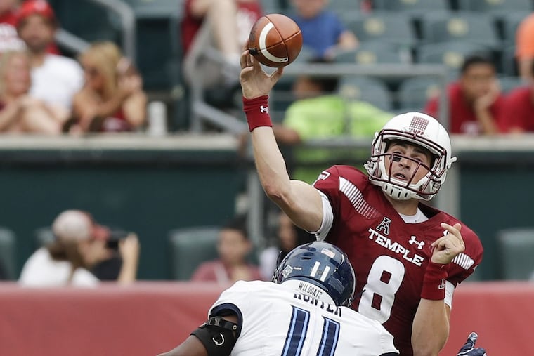 Temple quarterback Frank Nutile gets rid of football pressured by Villanova linebacker Keeling Hunter during the third-quarter on Saturday, September 1, 2018. YONG KIM / Staff Photographer