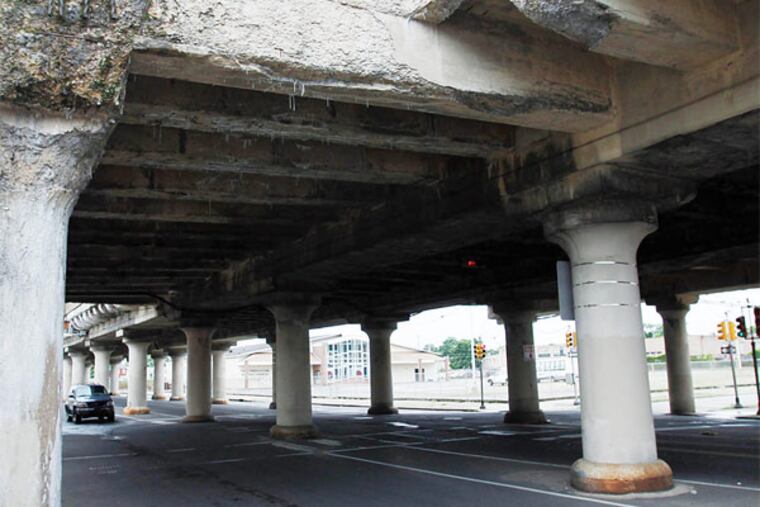 The worn-down CSX-owned railroad trestle.