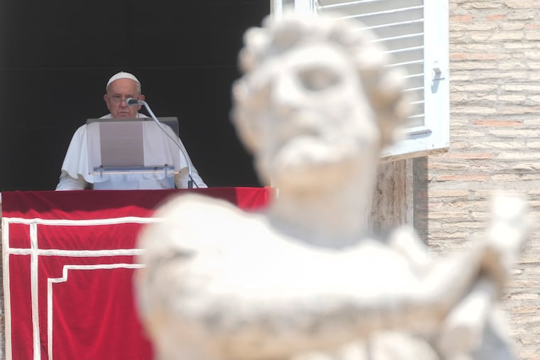 Pope Francis delivers the Angelus noon prayer in St. Peter's Square, at the Vatican, Sunday.