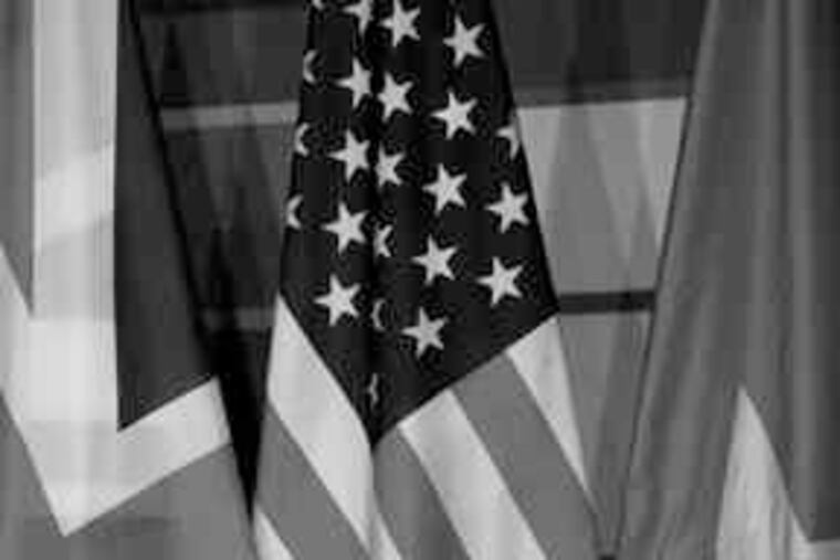 ANDREW HARRER / Bloomberg