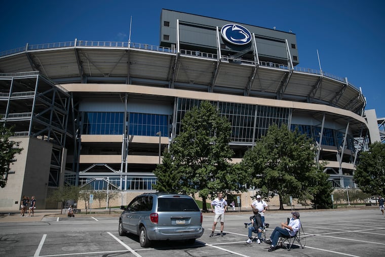 A few people hang out at an empty Beaver Stadium on Saturday, even though there is no game. Penn State football would normally be playing a game and hosting tens of thousands of fans, but due to COVID-19, the season was postponed by the Big Ten.