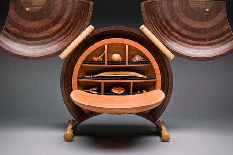 "Arca Botanicum" by Dixie Biggs and Ray Jones uses walnut, cherry, and boxwood from Bartram's Garden. Artists used wood salvaged from 13 varieties of trees that were damaged or toppled in a 2010 storm.