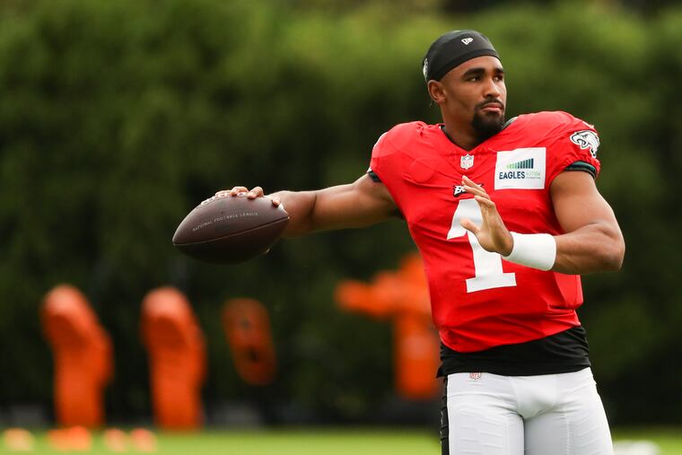 Eagles quarterback Jalen Hurts throws the ball during training camp at the NovaCare Complex on Saturday.