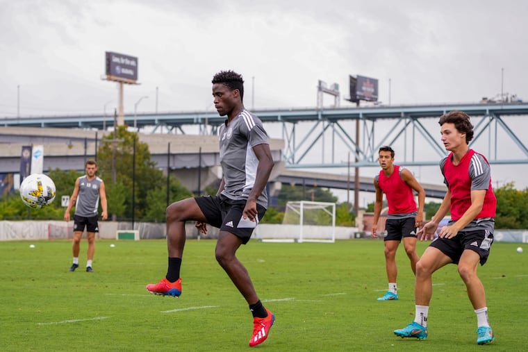 Richard Odada (left) at a Union practice last September.