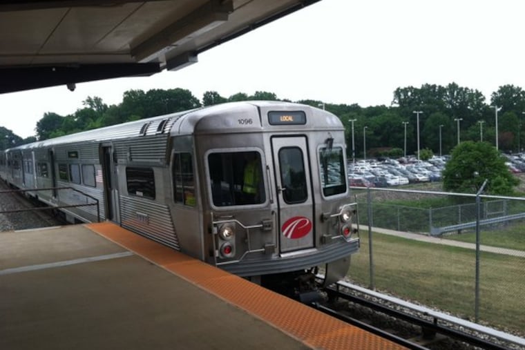 A PATCO train at the Woodcrest Station en route to Philadelphia.
