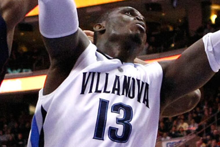 "I think he is getting better every day," Jay Wright says of Mouphtaou Yarou. (Ron Cortes/Staff file photo)