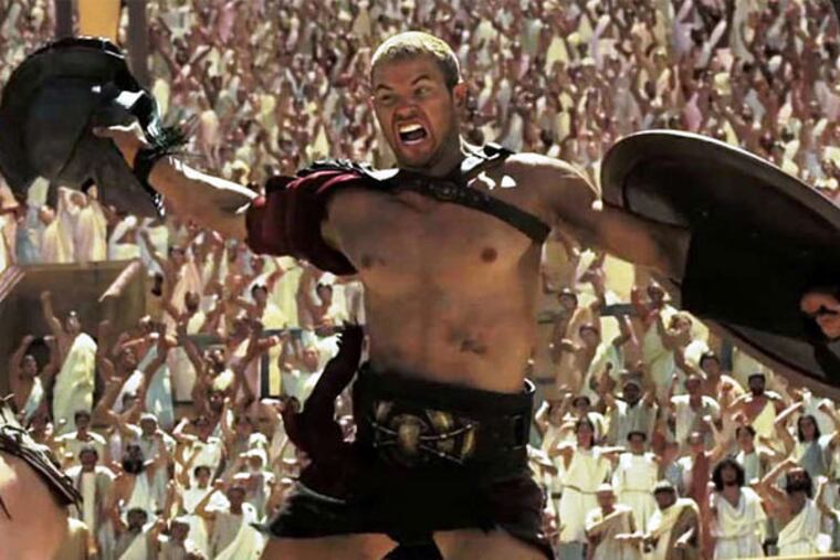 Kellan Lutz is Herc, banished, taken captive, and fighting as a gladiator to get back to Greece before his beloved marries another.