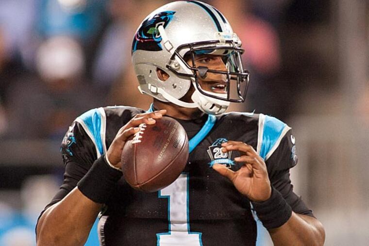 Carolina Panthers quarterback Cam Newton (1) drops back to pass during the second quarter against the New Orleans Saints at Bank of America Stadium. (Jeremy Brevard/USA Today)