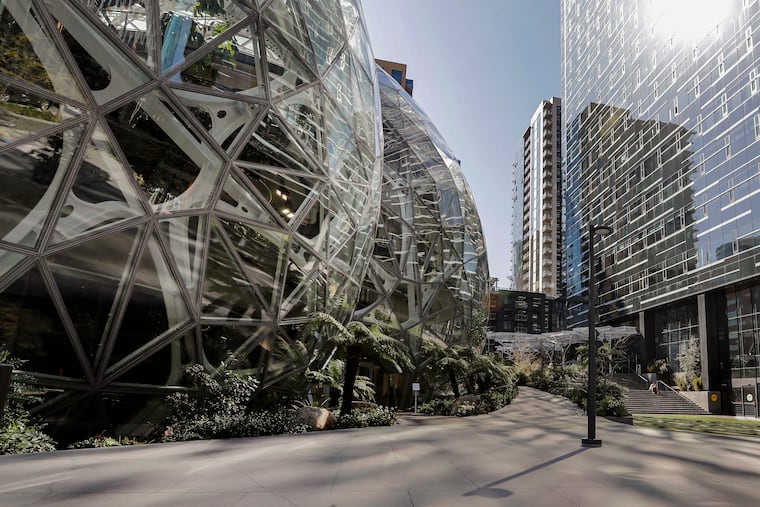 The exterior of the Amazon corporate headquarters in Seattle in 2020. CEO Andy Jassy had warned employees in June that cuts were coming, attributing the reductions to efficiencies created by the company’s use of AI.