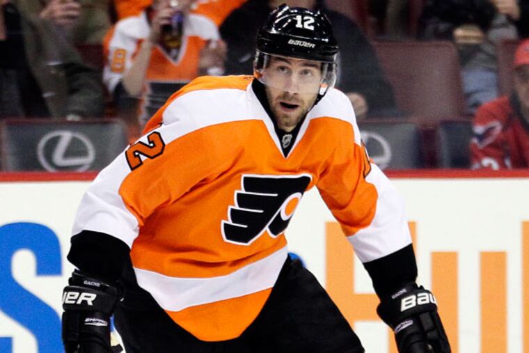 His agent has not had any discussions with Flyers general manager Paul Holmgren, he said, but Simon Gagne would like to remain a Flyer. (Tom Mihalek/AP)