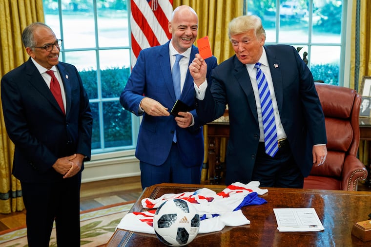 Carlos Cordeiro (left) was often seen standing in the Oval Office when FIFA president Gianni Infantino met with U.S. President Donald Trump in recent years.