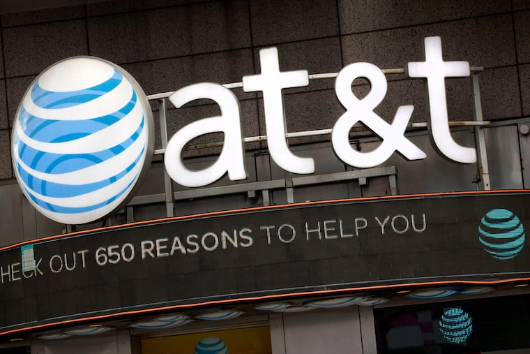 The AT&T logo is positioned above one of its retail stores in New York in 2016.