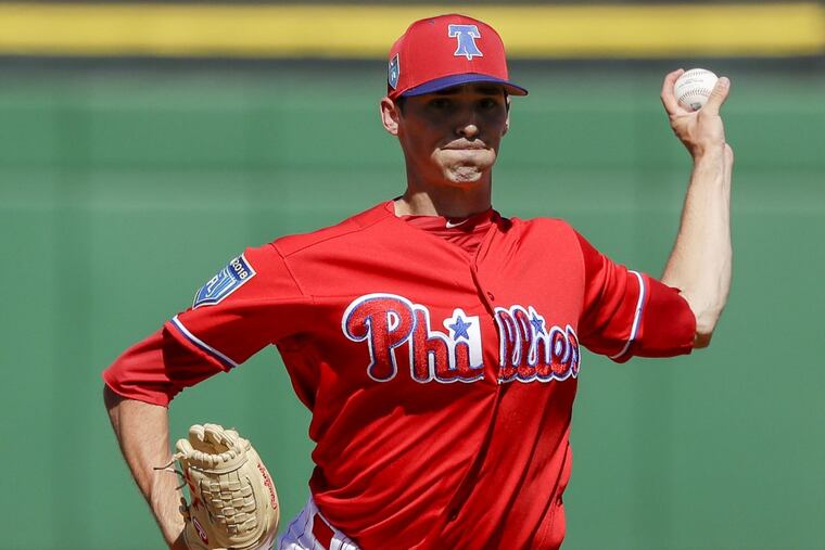 Phillies relief pitcher Hoby Milner throws a fifth-inning warm-up pitch during a spring training game.