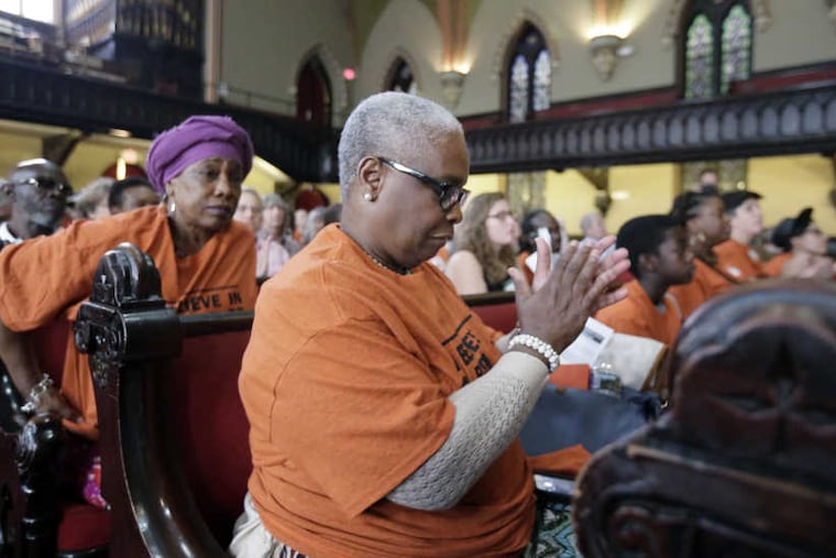 Catherine Joy Songster (center) mother of Kempis ‘Ghani’ Songster attended the “Community Resentencing" at the Arch Street Methodist Church in Philadelphia.