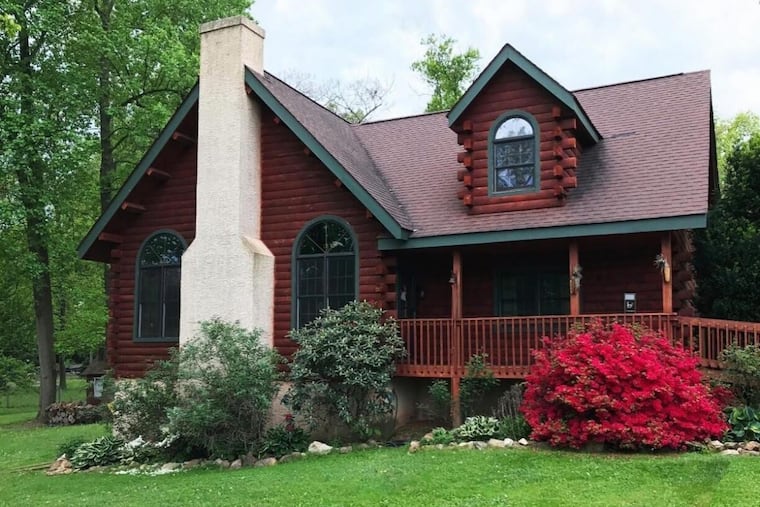 A log cabin for sale at 20 Chimienti Drive, West Grove, Pa.