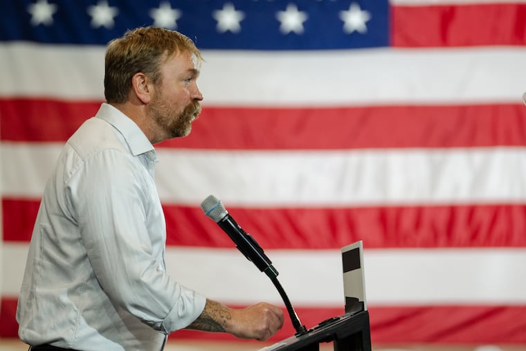 Graham Platner speaks to supporters in Blue Hill, Maine, after winning the Democratic nomination for the U.S. Senate on Tuesday.