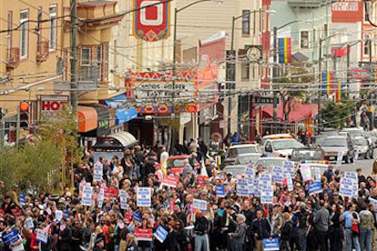 Advocates of same-sex marriage celebrate the decision at a rally in San Francisco on Wednesday. (Noah Berger / Associated Press)
