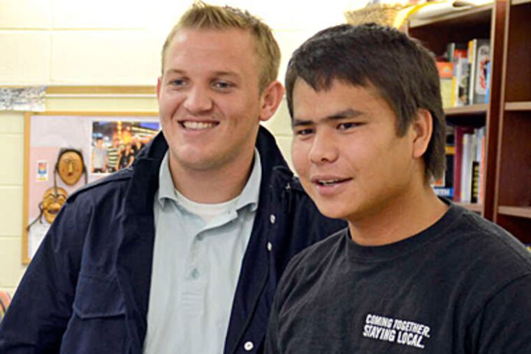 Seniors Bekim Daku (left) and Husseinali Akrami are part of Center City's Friends Select robust multinational population. (Tom Gralish/Staff)