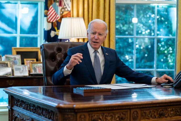 President Joe Biden speaks before signing an executive order to improve government services, in the Oval Office of the White House, Dec. 13, 2021, in Washington.