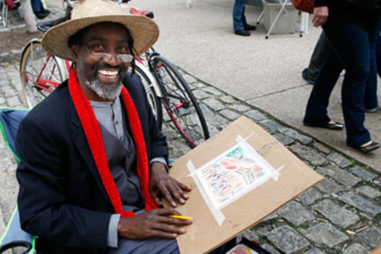 Artist Joe Barker at a recent Rittenhouse Fine Arts Festival.