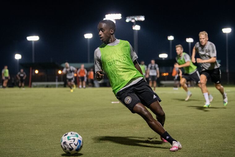 Philadelephia Union midfielder Jamiro Monteiro on the ball during a nighttime training session Sunday.