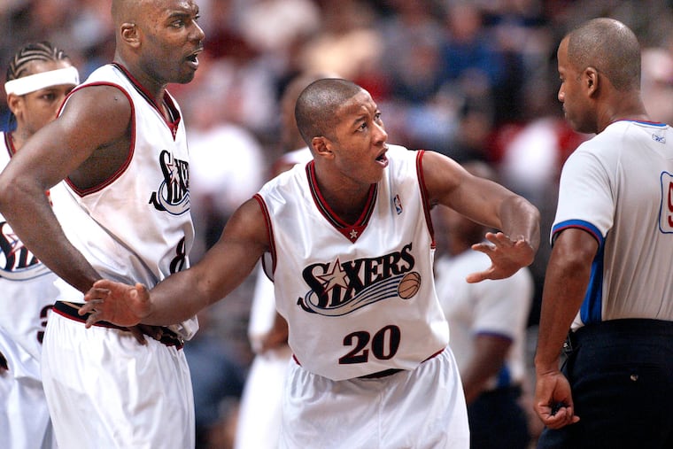 Eric Snow (20) and Allen Iverson (far left) teamed up in the Sixers' backcourt during the 2000-01 run to the NBA Finals.