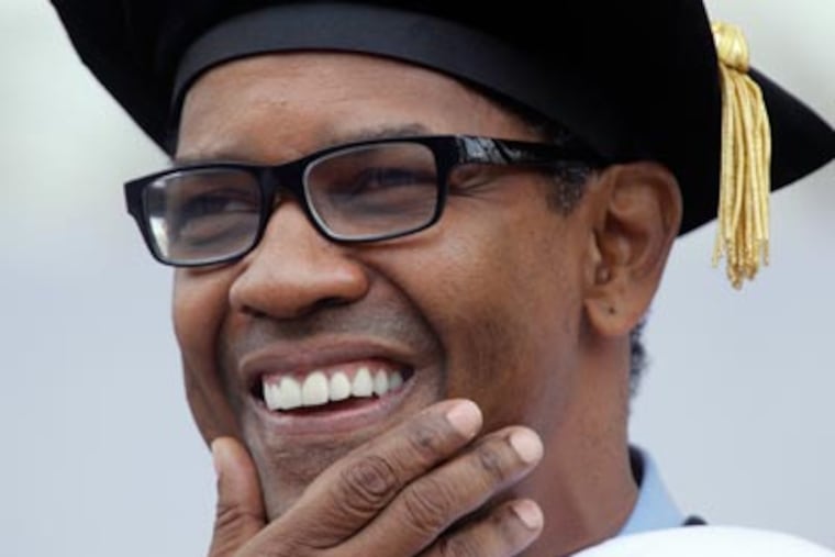 Actor Denzel Washington makes remarks during the University of Pennsylvania's 255th Commencement on Monday. The actor, whose son Malcolm attends the Ivy League school, received an honorary degree at the ceremony. (AP Photo/Matt Rourke)