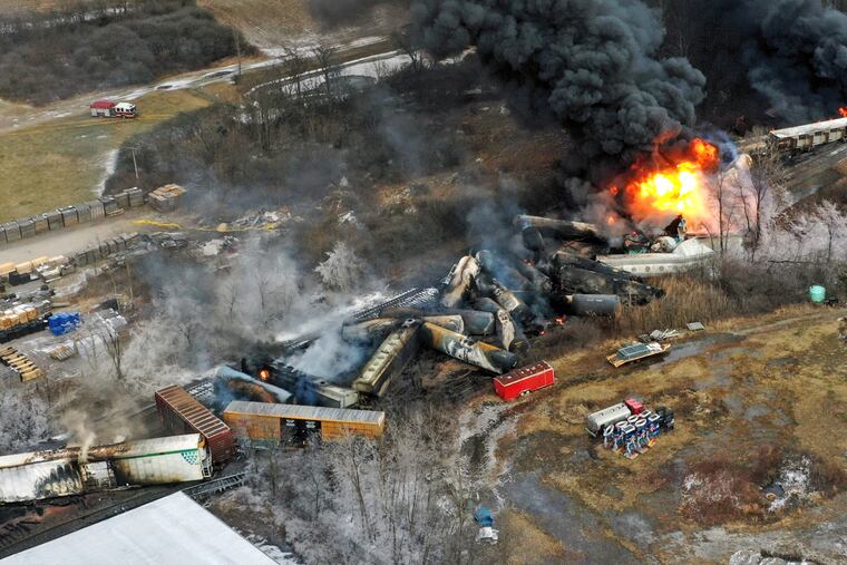 This photo taken with a drone shows portions of a Norfolk Southern freight train that derailed in February in East Palestine, Ohio, are still on fire.