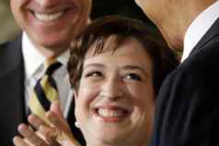 Solicitor General Elena Kagan is applauded by President Obama and Vice President Biden at the White House as she is introduced as Obama's nominee for the Supreme Court.