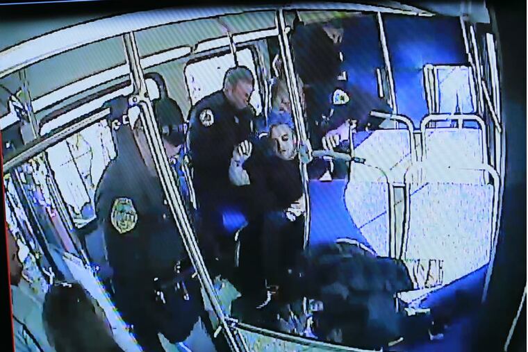 Michael Meeney was recorded on a bus using heroin and collapsing, He was revived and was arrested — in part to force him to get help, police say.