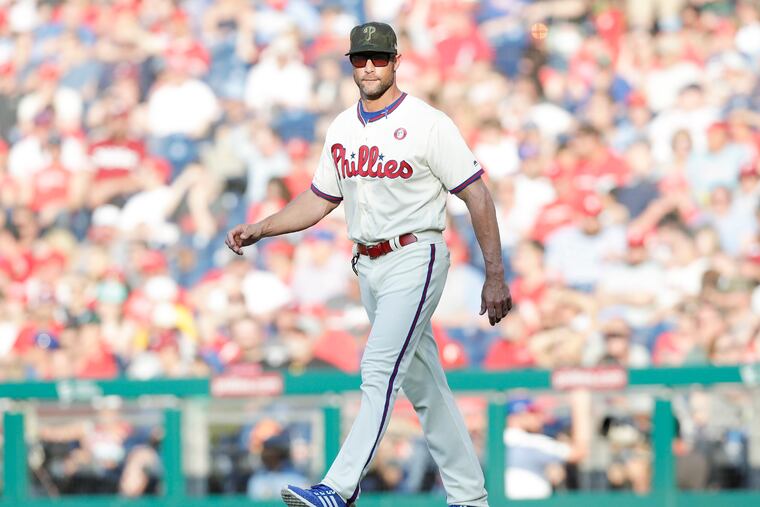 Phillies Manager Gabe Kapler walks to the pitchers mound against the Colorado Rockies on Saturday, May 18, 2019 in Philadelphia.