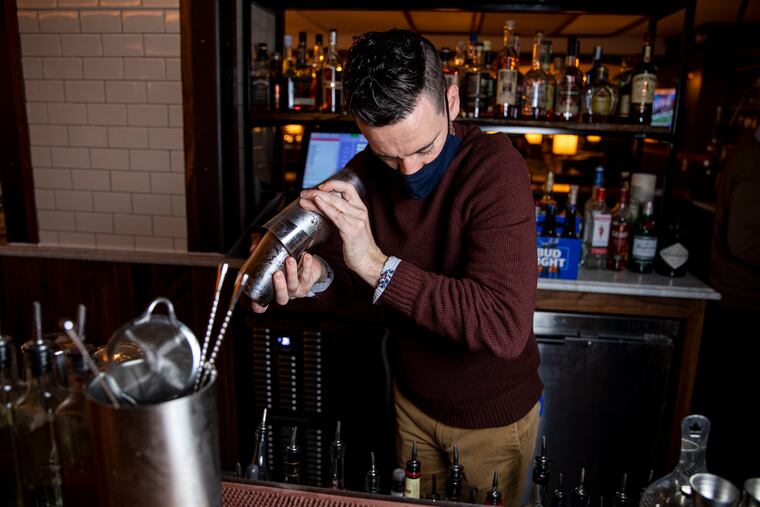 Mike Haggerty, beverage manager, mixes up a nonalcoholic Pen/acilin, made with lemon, honey, ginger, and lapsang souchong tea, at the Refectory at Villanova’s campus in Villanova, Pa.