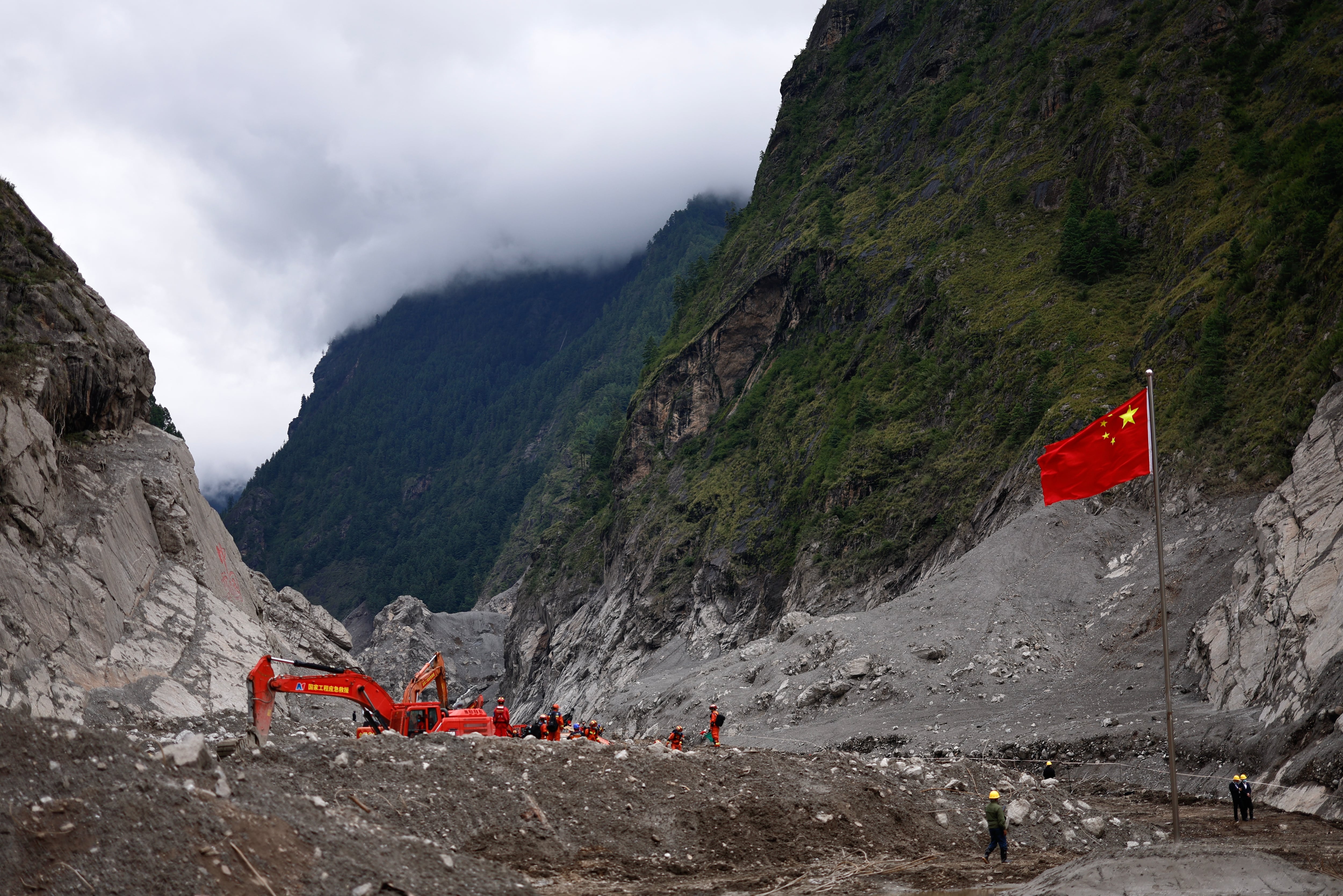 A month after Nepal-China floods, families await answers about more than 50 missing Ukrainians