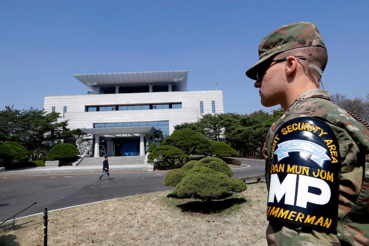 A U.S. soldier stands outside of the Peace House t the southern side of the Panmunjom in the Demilitarized Zone in South Korea. An American has crossed the heavily fortified border from South Korea into North Korea.