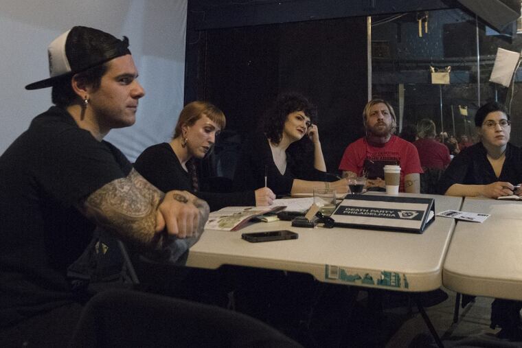 From left, John Haldeman, Julia Porter, Kelly Crodian-Shuff, Hobart Frolley and Evi Numen, members of The Death Party gathered for a club meeting in Philadelphia. Sunday, Jan. 28, 2018.