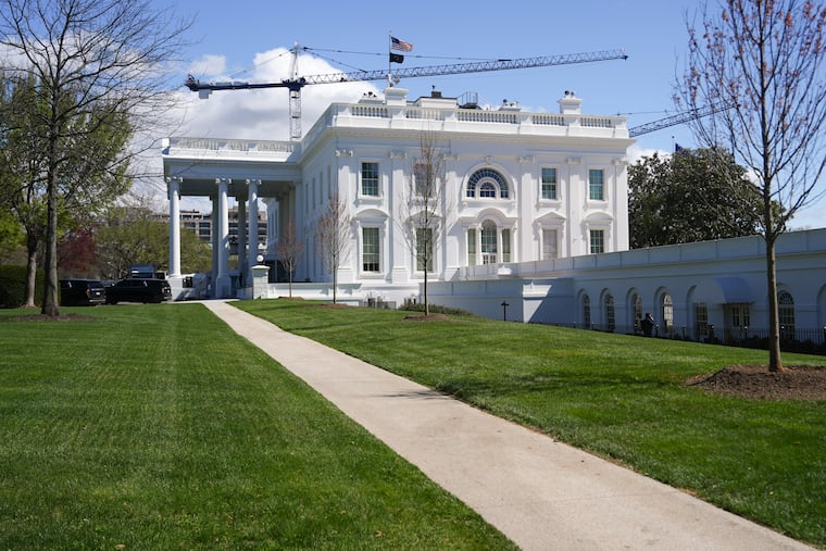 Construction cranes being used for the White House ballroom are seen around the White House, Monday, March 23, 2026, in Washington.