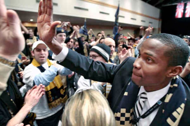 ELIZABETH ROBERTSON / Staff photographer