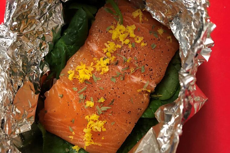 Salmon in foil with spinach and cream, as prepared by students at Wiggins School during week five of the spring 2019 My Daughter's Kitchen cooking program.