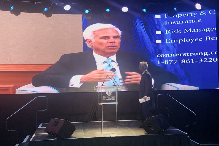 George E. Norcross 3d takes the stage Tuesday during the Cooper's Ferry Partnership's annual meeting in Camden.