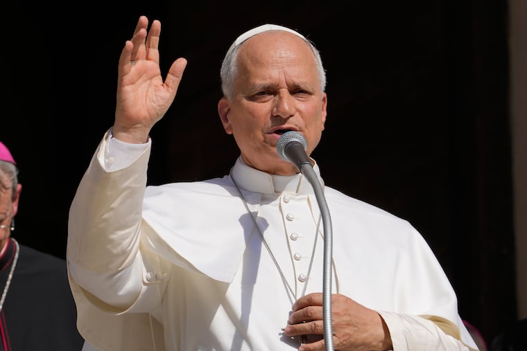 Pope Leo XIV delivers his blessing as he visits Pavia's Cathedral, northern Italy, on June 20, 2026. (AP Photo/Luca Bruno, File)