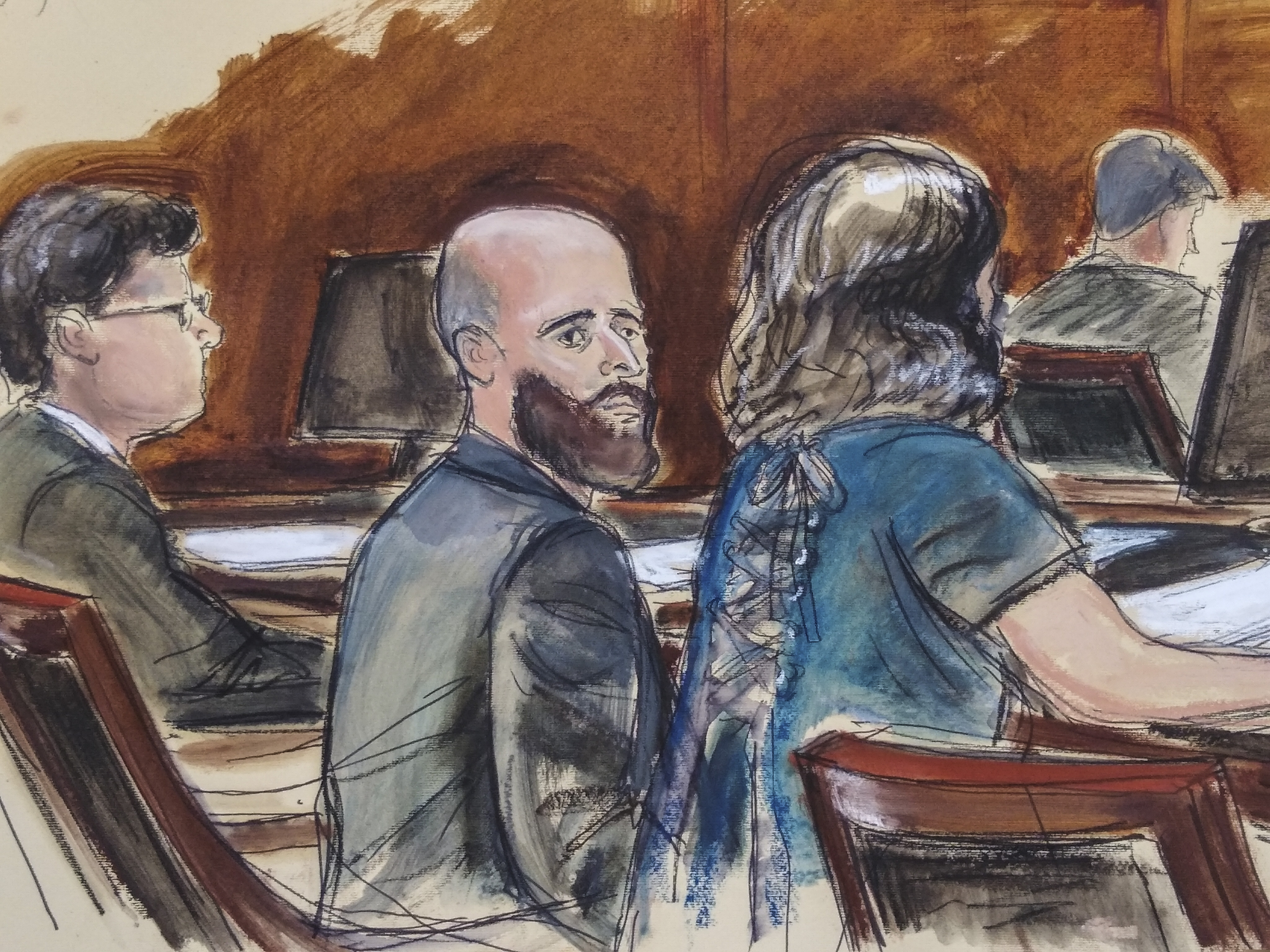 In this courtroom sketch Joshua Schulte (center) is seated at the defense table flanked by his attorneys during jury deliberations last week.