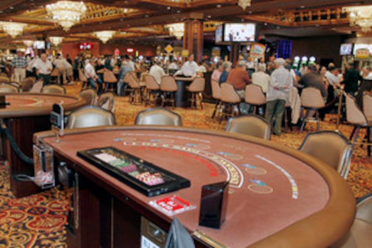 Blackjack tables stand empty at the Taj Mahal, reflecting the not-so-hot August experienced by the Atlantic City gambling halls. Their take was down 5.9 percent from a year earlier.