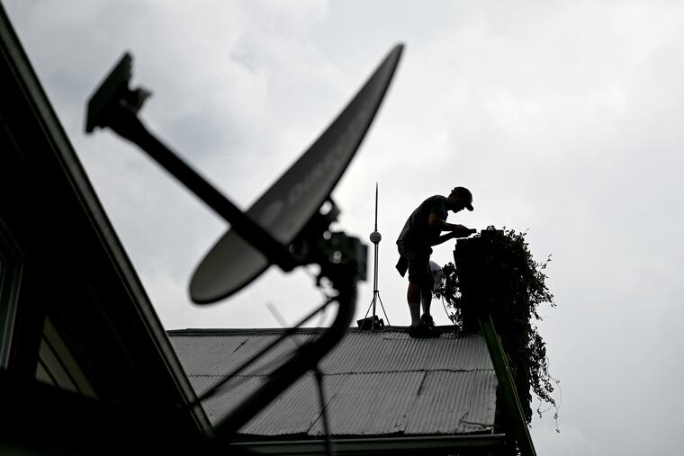 Technician Patrick Whitehill installing equipment in Juniata County on Aug. 11, 2021. The infrastructure bill passed in the Senate last year will bring $100 million to expand broadband in Pennsylvania. Juniata County is one of several rural counties in the state where as many as 35% of residents don't have access to the internet.