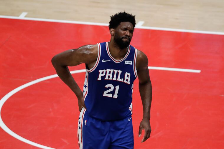 Joel Embiid left during the first quarter of Game 4.
